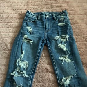 Ripped high waisted blue jeans